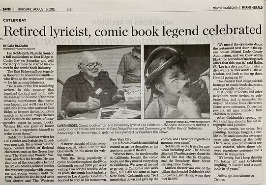 A newspaper clipping headed "Retired lyricist, comic book legend celebrated", with two photos