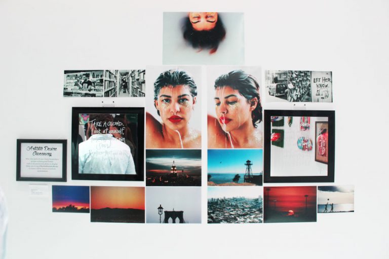 A wall collage of portraits and sunset photos in a white gallery
