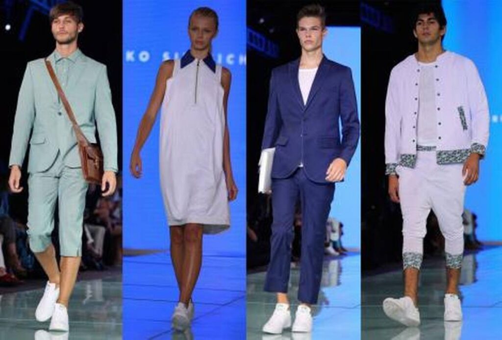Four menswear and womenswear looks in mint, white, navy and white on a blue-lit runway