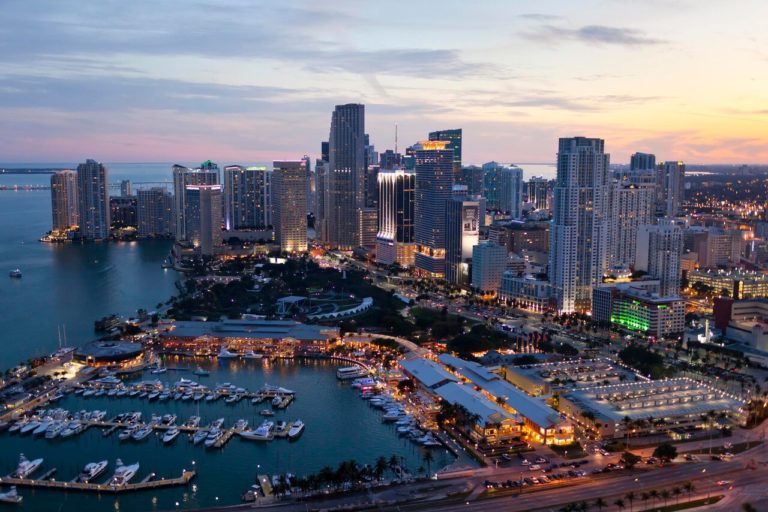 Downtown Miami's skyline and marina at dusk, seen from above