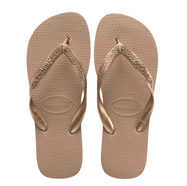 A pair of rose-gold flip flops